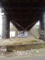 Underneath the bridge. The retaining wall in this shot used to hold back the River Frome before it was diverted during the construction of the M32.