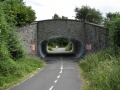 The bridge carrying the road across the cycle path. Obviously this a rebuild and not the original structure.