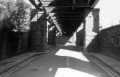 A rather poor shot taken in 1986. A road used to pass under the bridge and the whole area was enclosed and dark.