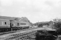 Looking in the other direction, and with Mangotsfield station as a backdrop, the Peak passes by with a north bound service. © Clive Moore