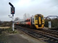 158842 glides into the station. The feather on the signal is for the line to Severn Beach via Narroways Junction which is just to the north of this station.