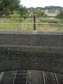 Standing on the road bridge at Bellotts Road and looking in the direction of Bristol. The old Somerset and Dorset railway bridge blocks the view.
