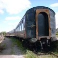 Coaches stored on the former bitumen sidings located behind the station.