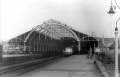 A view of the station taken in 1959. The train shed lost a lot of glass during bombing raids in April 1942. This wasn't replaced until restoration of the building after closure.