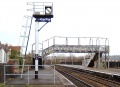 A closer look at the distant signal and the footbridge.