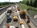 The trackwork was complete through the station and was being ballasted and compacted. The back-filling of the platform was almost complete and was being readied for its top surface.