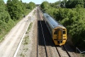 158826 trundles past the site of Horfield Station and under the bridge at Lockleaze Road.