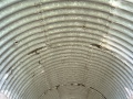 The roof of the arch has been reinforced with corrugated iron.