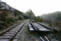 various bits of the line that I remember as a lad have been torn up and stored alongside the running line. The storm drain just visible on the right had it's own railway system during construction. © Andrew Ross