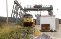 56050 under the refuse loading bay at Westerleigh Sidings. 30.7.92. © Dave Higson