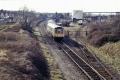 Bubblecar B126 leaves the station. The oil depot can be clearly seen behind it. 7.3.87 © Andrew Bartlett