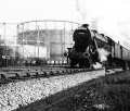 An enthusiasts special headed by Stanier 48706 passes the junction. The milepost opposite the train marks the start of the 1-50 climb out of Bath. This loco worked several specials over the S&D prior to its closure. © Roger Porch