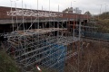 The bridge had a scaffold structure alongside which was to become a temporary pedestrian bridge as the road bridge was rebuilt and strengthened.