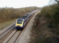 Looking East as a HST blasts past on the mainline.