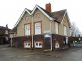 The station building as viewed from the approach road. The date 1906 is embedded into the gable. This is when the station was rebuilt and the line doubled.