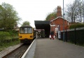 143611 stops at the station on its way to Temple Meads with an Avonmouth service.