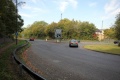 The view towards Ryeford. The A419 cuts through the alignment of the railway, although the trackbed does survive on the other side of the roundabout.