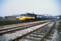 An HST powers past on the main line as viewed from the Bristol West Depot carriage sidings.