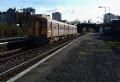 In brilliant winter sunshine, 150236 heads towards Temple Meads.