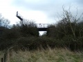 The bridge at Hallen Moor. The signal protects the crossover that allows single line working between Avonmouth and Filton. There was supposed to be a footpath here but someone had fenced it off and allowed the brambles to take over the area. This was as close as I could get.