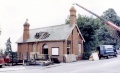 Demolition begins on the booking office and pedestrian footbridge in 1973. © Simon Whittingham