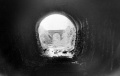The view from inside Devonshire Tunnel looking back towards Bath. The bridge in the background is that at Maple Grove. © John Rawlings