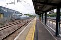 The view east from the west end of platform 3 with the Network Rail Training Centre visible alongside.