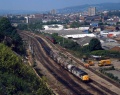 37673 passes the remains of Pylle Hill with the 6C46 St Blazey to Avomouth. 25.9.97 © Neil Higson