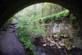 The derelict Bakers Mill Upper Lock viewed from under the bridge.