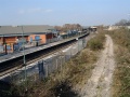 Across the road bridge and the view of the removed main lines. I used to stand here and watch loose-coupled freights crawl along while on my way to the model railway shop next door.