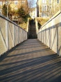 Looking across the footbridge towards the exit on Cromwell Road.