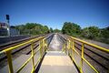 The view north from the end of platform 2. The yellow railings are an emergency refuge.