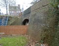 The eastern portal of Redcliffe Tunnel was slowly disappearing behind buildings.
