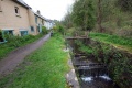 The head of the lock is crossed by a small footbridge.