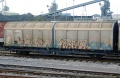 A better look at a graffiti covered wagon.