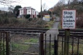 The railway crossing as viewed from the Thames and Severn Canal.