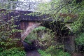 The much repaired original humpback bridge as approached from the west.