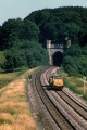 A track machine leaves the tunnel and heads in the direction of Bristol. © John Rawlings