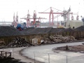 A general view of the stockpiles of coal, and the cranes used to unload ships.