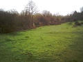 Line of the depot fence along the fields. © Julien Weston