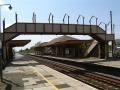 Looking west gives a general view of the station. The footbridge is the original one that spanned the broad gauge tracks when the station opened.