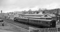 Local train for Wadebridge and Padstow in platform, headed by an LMS-type Ivatt Class 2 2-6-2T. Copyright Ben Brooksbank and licensed for reuse under this Creative Commons Licence.