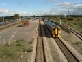 A general view of the station with 158817 passing through. This is the view towards England.