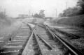 A view of Mangotsfield South Junction taken in 1968. This shows the lines to the station still in situ, the lines to North Junction singled, the old lamp hut and Carson's factory. The spot where this photo was taken is now a rather large roundabout on the Avon Ring Road. © Peter Rendall