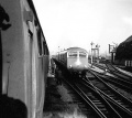 The Blue Pullman heads east with a service for London and passes Bristol East depot. The Up yard is still in use and the signal box controlling it can just be seen on the right. A trackgang can be seen sandwiched between the two trains. Not a yellow vest or other safety device to be seen! © Roger Porch