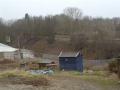 A view from Station Road of the embankment north of Ashley Hill. The bridge just visible in this shot is the one at Muller Road.