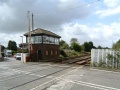 The level crossing and signal box at Station Road in the St Georges area of Weston Super Mare. Weston Super Mare is to the right in this photo.
