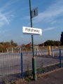 The station sign as attached to lamposts throughout the station.