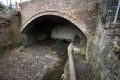 The infilled bridge with the culverted canal passing underneath.