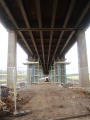 A view from underneath the bypass. The railway crosses where the brownish coloured line is at the top of the photo.